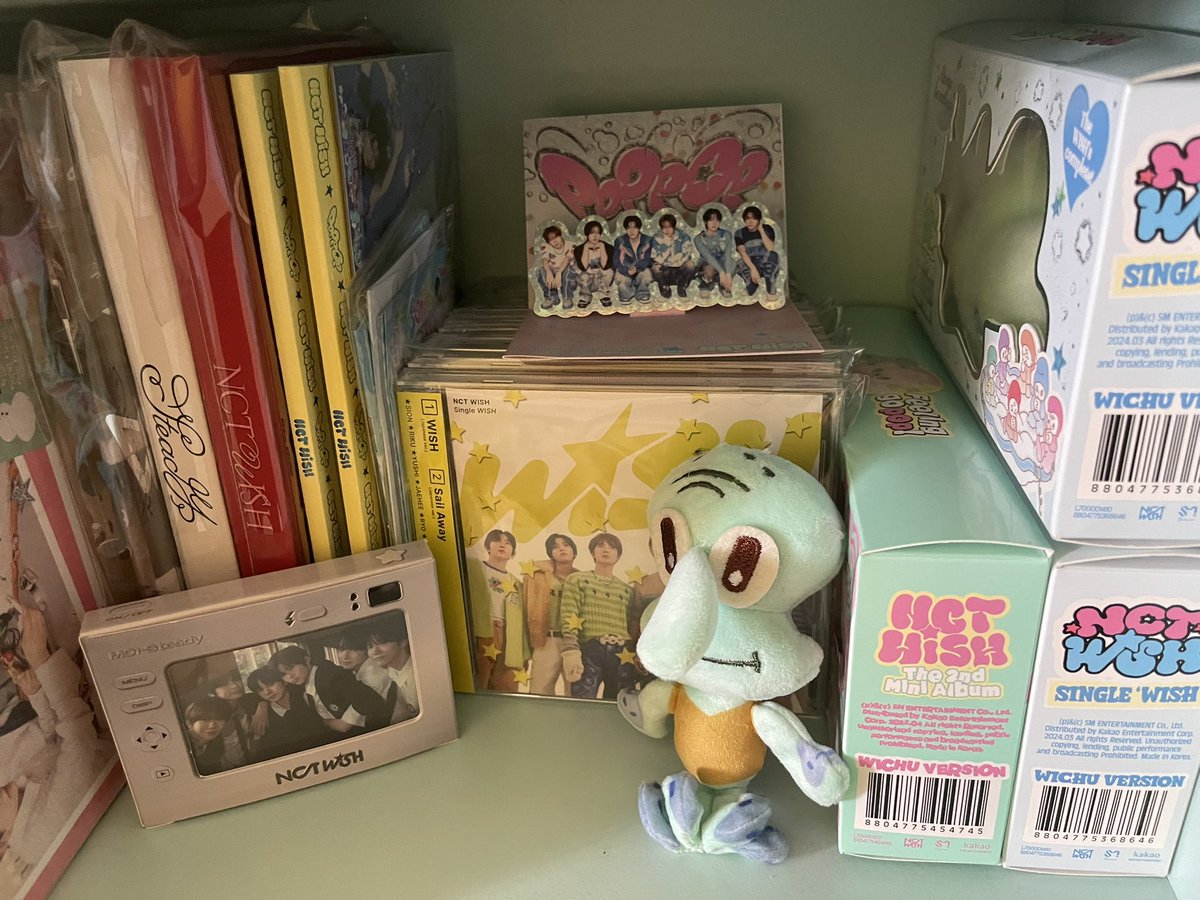wichuponastar's tweet image. my sister got this squidward keychain and its been sitting on my wish shelf for 2 weeks now