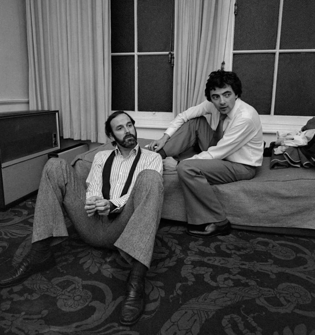 historydefined's tweet image. John Cleese and Rowen Atkinson - 1980s
