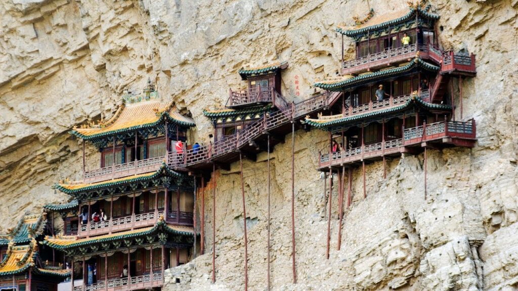 At the end of Shenmue III, our heroes are heading to the Cliff Temple. 🚶‍♂️🚶‍♀️🧍

Here is an early render of this accurately portrayed cliffside temple, shown alongside its real-life counterpart!

We can't wait to reach this area in Shenmue IV. #LetsGetShenmue4