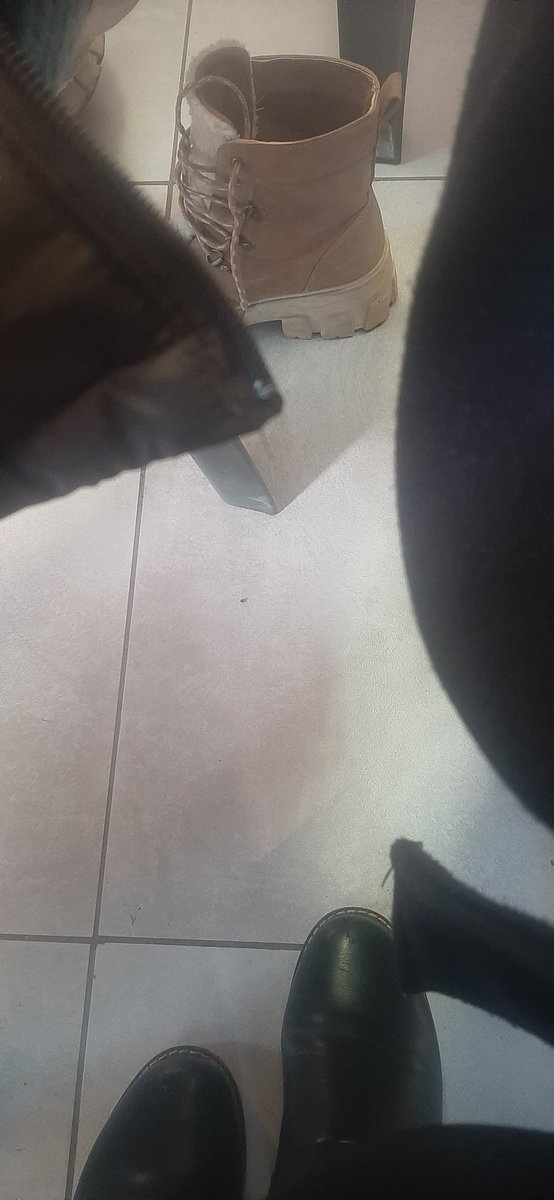 Lieketso15's tweet image. We're at LBSE workshop and training at LCE where we've not even been given tables to work on. Fine but why has this lady removed her shoes kannete? Aii matichere re itella pele hleng aii no wonder ba re timme litafole re penyetsa laptop liropeng. Mxm