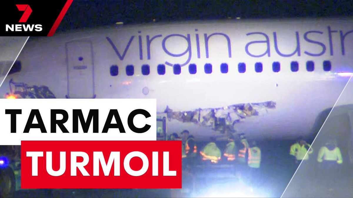 7NEWS Melbourne (@7newsmelbourne) on Twitter photo Virgin Australia is facing a multi-million-dollar repair bill after a plane collided with a tow vehicle on the tarmac. It was the first of two major incidents at Melbourne Airport, with a driver also injured in a truck rollover. youtu.be/pmyzBq_2Mpg <a href="/jacstanley7/">Jacqueline Stanley</a> #7NEWS Virgin Australia is facing a multi-million-dollar repair bill after a plane collided with a tow vehicle on the tarmac. It was the first of two major incidents at Melbourne Airport, with a driver also injured in a truck rollover. youtu.be/pmyzBq_2Mpg <a href="/jacstanley7/">Jacqueline Stanley</a> #7NEWS