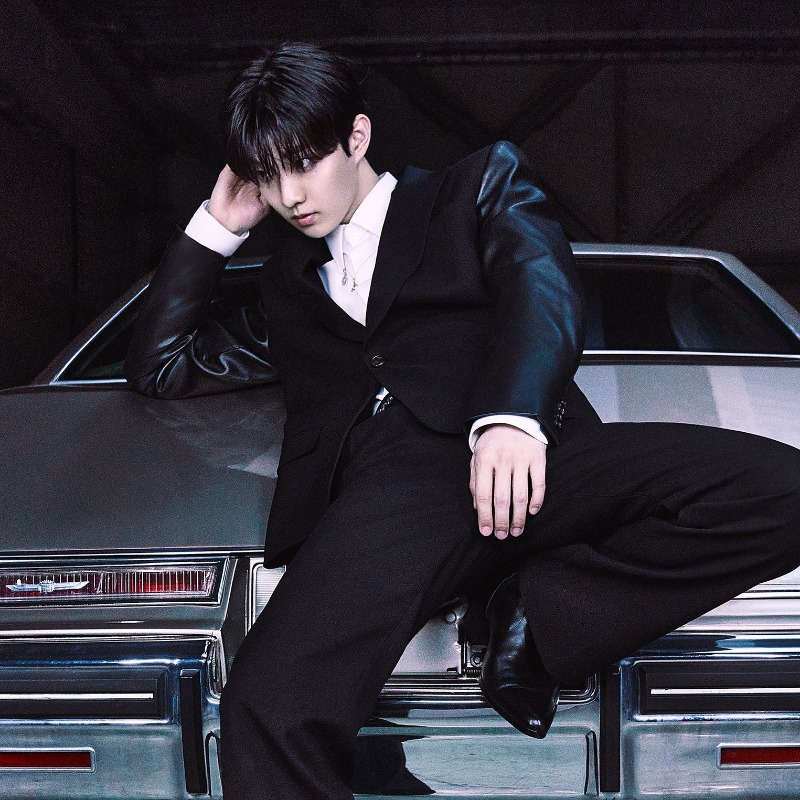 Chungmin's tweet photo. As sincere as the finest gentleman, captivating in a tailored black suit—fierce in the pungent eyes that unleashes a charismatic haze upon those who dare meet his gaze. Marked as precious, as the heir to an unshaken legacy. Initial reveal, ⓘ 𝗖𝗼𝗻𝗰𝗲𝗽𝘁 𝗣𝗵𝗼𝘁𝗼: 𝗙𝗹𝗼𝘄.
