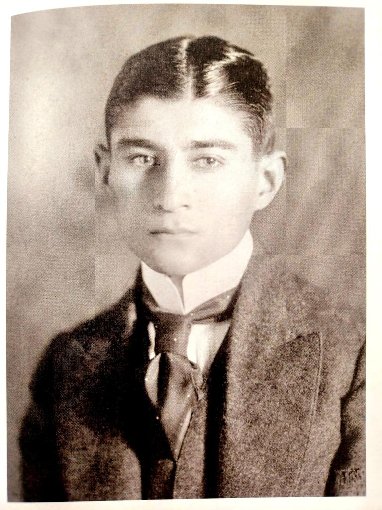 I am sending you a flash photograph of myself. I haven’t in fact got a twisted face; it’s the flash that gives me that visionary look, and I have long ago abandoned high collars. 

The tie is a real showpiece; I bought it on a trip to Paris.

Franz Kafka, 1912.