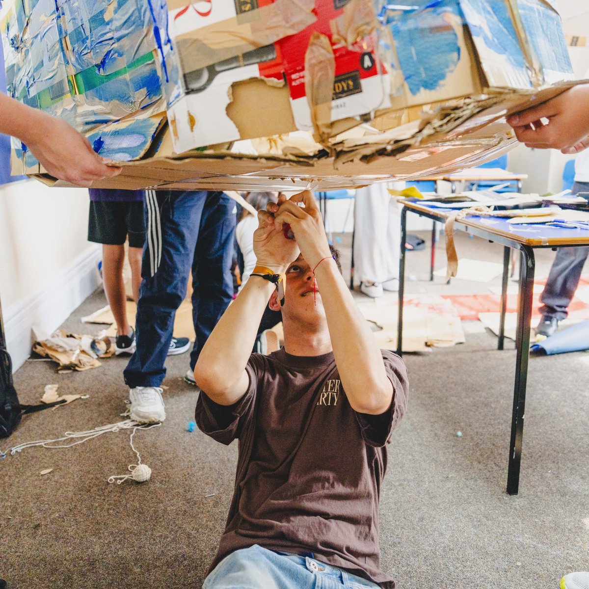 Our students turned cardboard into creativity and raced their custom-built cars in the wackiest race of the summer!