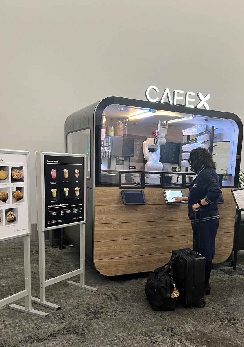 StuffKeithBuys's tweet image. Coffee crisis averted. I found the CafeX robot coffee vendor in the airport who is open 24/7. His robotic arm waved me goodbye as I walked away. Coffee and Scone were good and well needed.