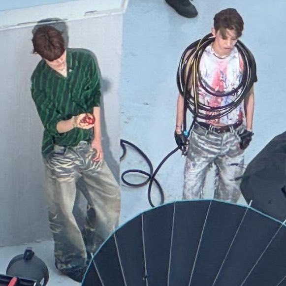 1DOHUN's tweet image. the styling is so sickening oh dohun just serving pure cunt with a hose around his neck and whoever that boy beside him is posing with an apple this is about to be the best song we’ve ever heard or a big mess 😭