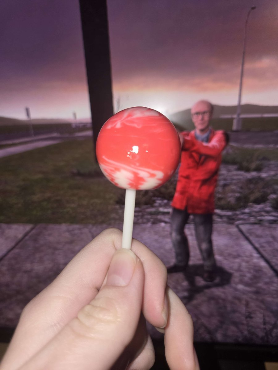 cyanociitta's tweet image. probably my favorite picture i've gotten of a lollipop in front of a computer screen