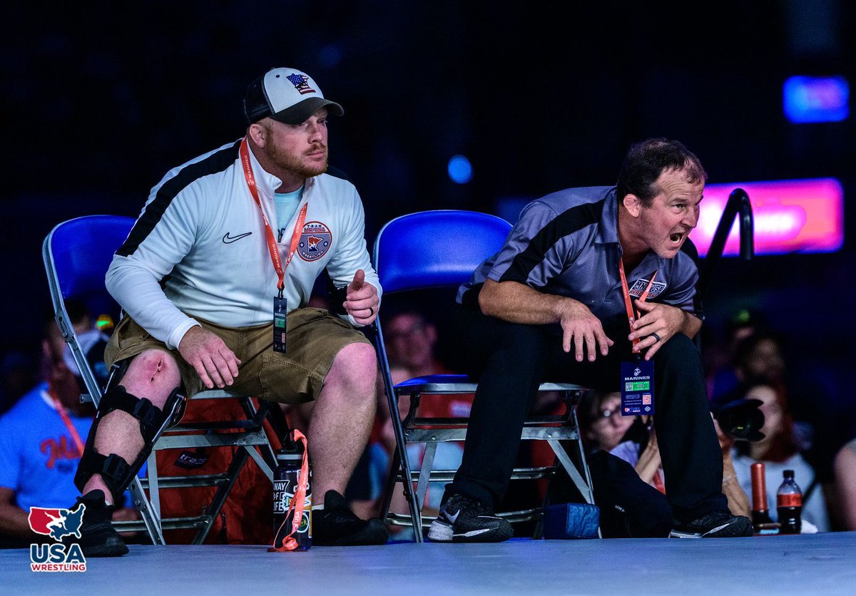 MNUSAW's tweet image. Coaches Corner - captured in Fargo with Tyler Faust on the left and Brandon Paulson on the right. Every coach has something on their mind: 
⬇️ Drop a caption below! What’s being said, or what’s each coach thinking in this moment? 
#mnusawrestling #mnstorm
