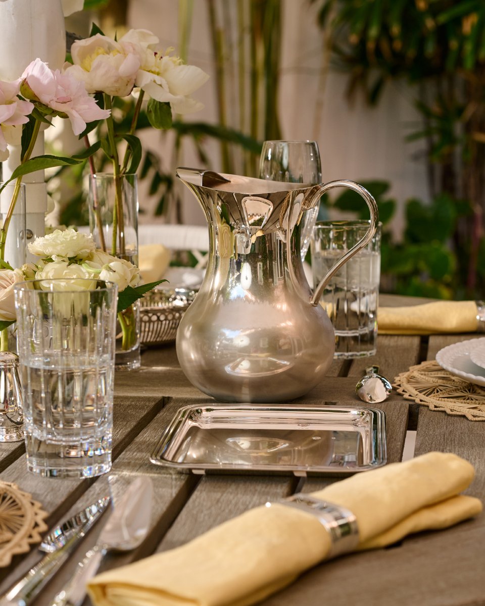 Brunch is served al fresco—Iriana crystal catching the light, candles glowing in Babylone hurricanes, and porcelain plates framed with Infini Christofle flatware. 
Discover at christofle.com.
#christofle #GreetingsFromFlorida
