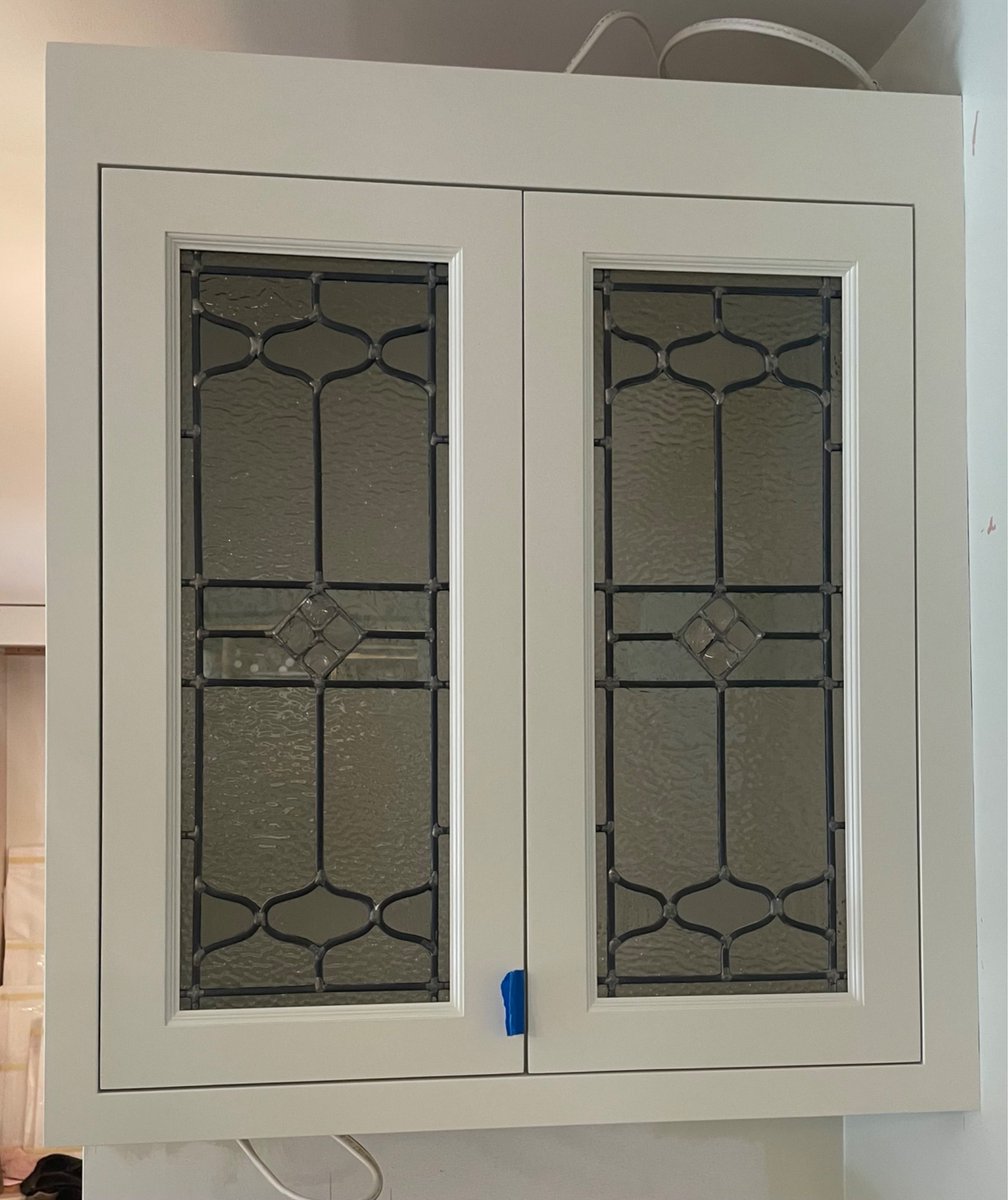 Clear leaded glass panels for cabinet doors. The centers are dalle de verre chips. Cabinets are from Hickory Creek Cabinetry in Pennsylvania.
