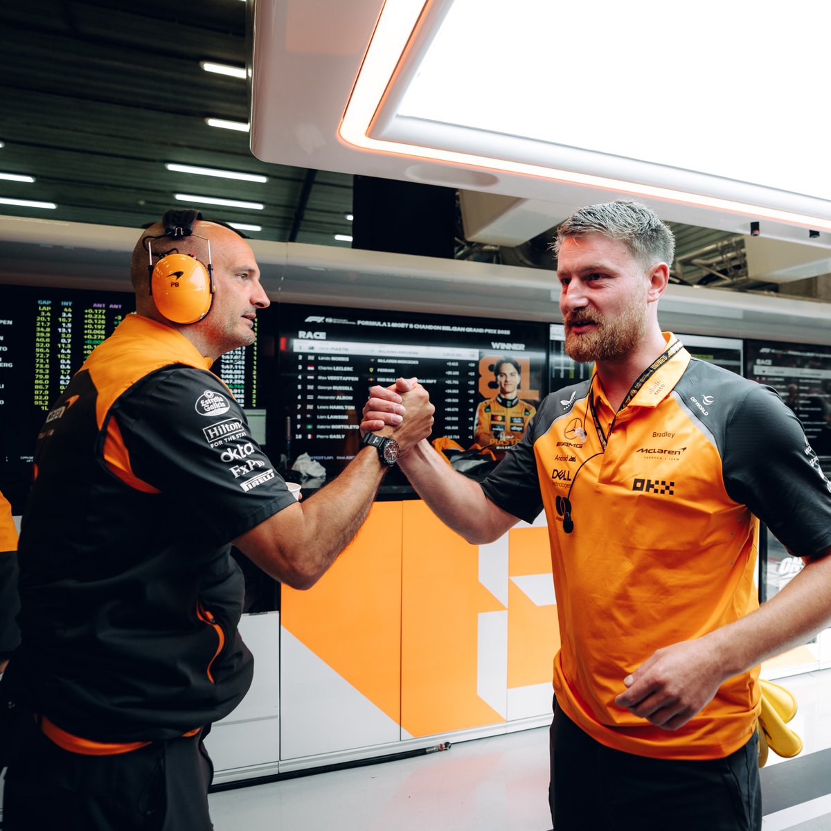 McLarenF1's tweet image. Celebrating a strong weekend with our papaya family 🧡

#McLaren | #BelgianGP 🇧🇪
