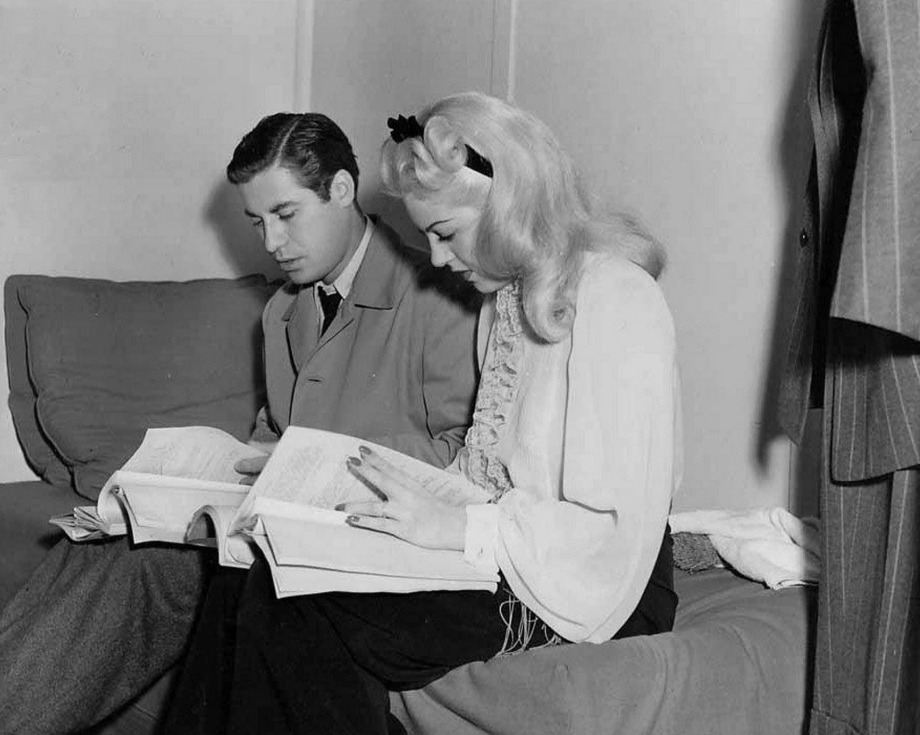John Hodiak and Lana Turner study their scripts during the filming of Marriage Is a Private Affair (1944)
