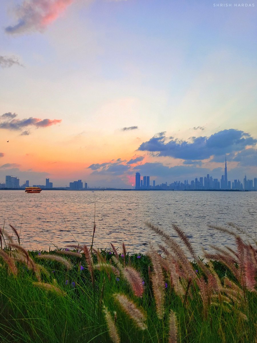 A soft sunset with its subtle shades spreading over the sea and skyline. Captured from the Dubai Creek Harbour view point! 🌅 

Photo by <a href="/ShrishHardas/">Shrish Hardas</a> 

#dubai #dubailife #photography #photographer #sunset #beauty #nature #sea #view