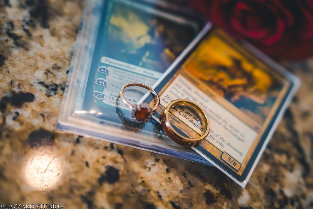 When you meet through <a href="/wizards_magic/">Magic: The Gathering</a> , it only makes sense that your wedding has some MTG in it! Thanks Wizards for making such an awesome game that brought us together 💖  
📸 Photos by @lazzarostudios