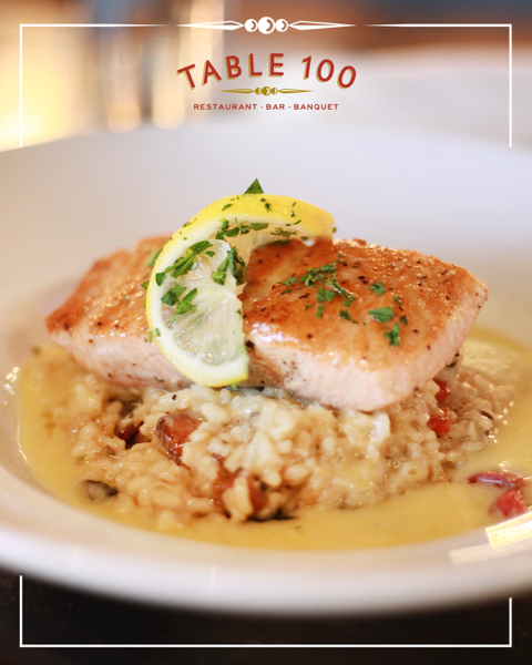 Enjoy the season's bounty with every bite of our Pan Seared Atlantic Salmon over creamy summer vegetable risotto.