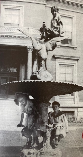 Did you know?
Governor Herbert Hadley (1909-1913 administration) used a campaign slogan of "Let the Children Play on the Grass."   Below is a picture of his children playing in the Mansion yard and on the old fountain that used to be in place of the current children's fountain.