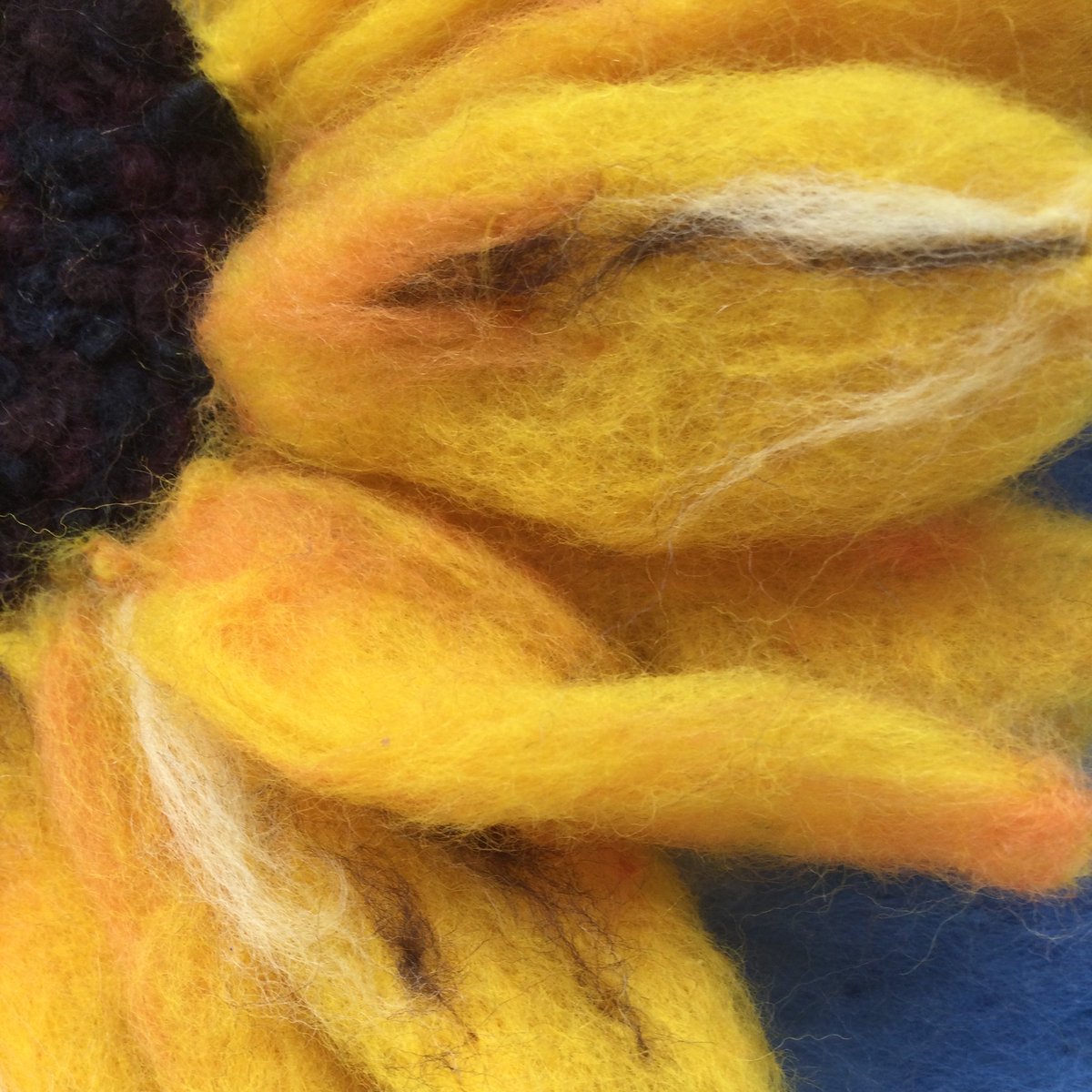 This is the first time in ages that I haven’t grown sunflowers in my garden. Difficulties with germination, slugs and squirrels means I’ve been marvelling at other people’s sunflowers while creating my own needle felted versions. #hobbzdesigns #sunflowers #textileart sunflowerart