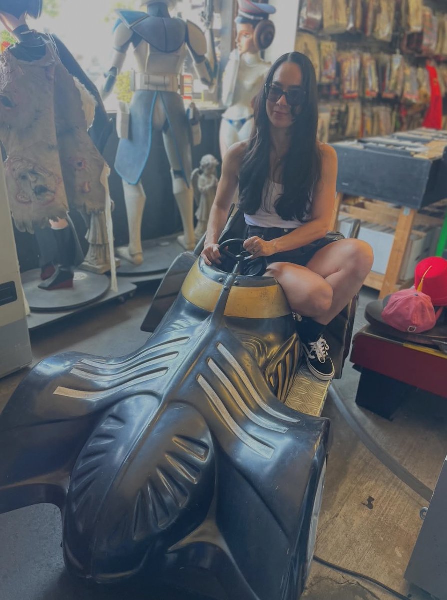 AJ Lee in the Batmobile 🦇