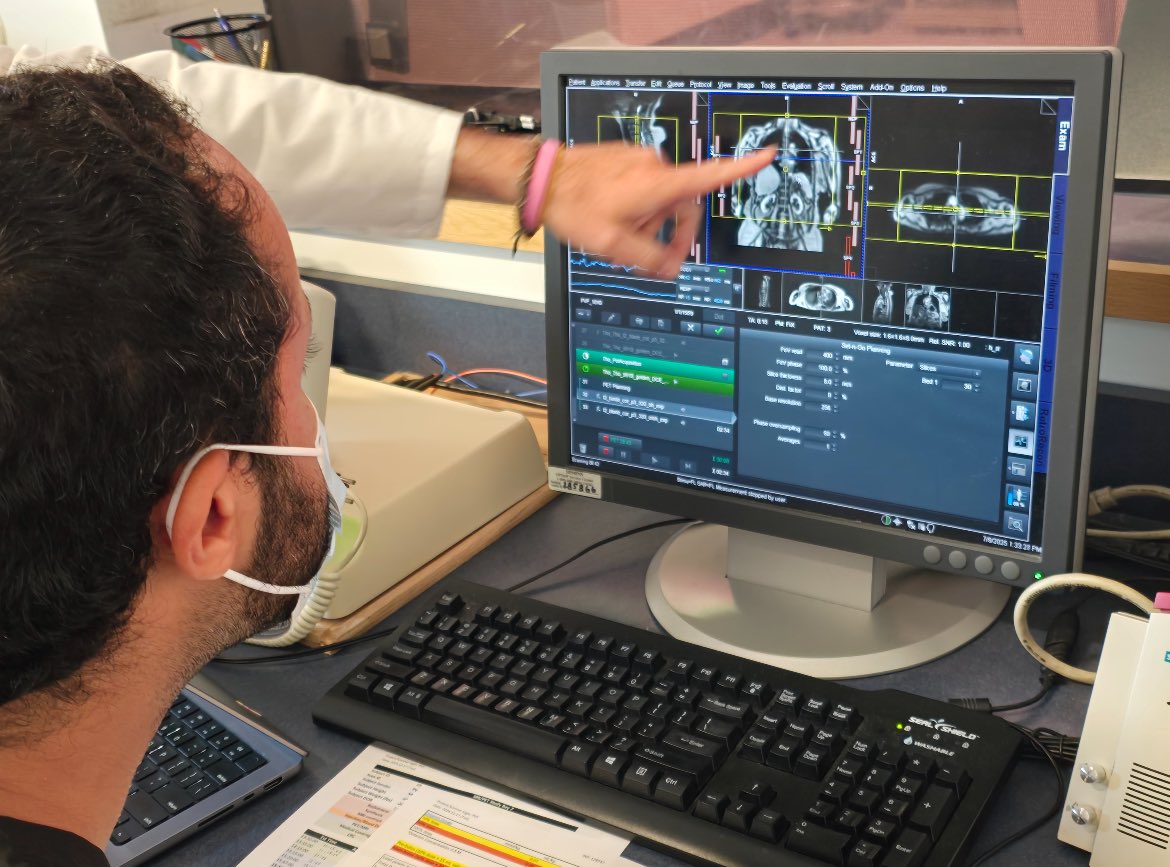 Research technician Salah Assana scans a Long Covid patient for fibrin accumulation with PET full-body imaging. This study assessing fibrin accumulation, run by Drs VanElzakker &amp; Izquierdo, is recruiting for LC patients in Boston with lung issues that standard imaging does not