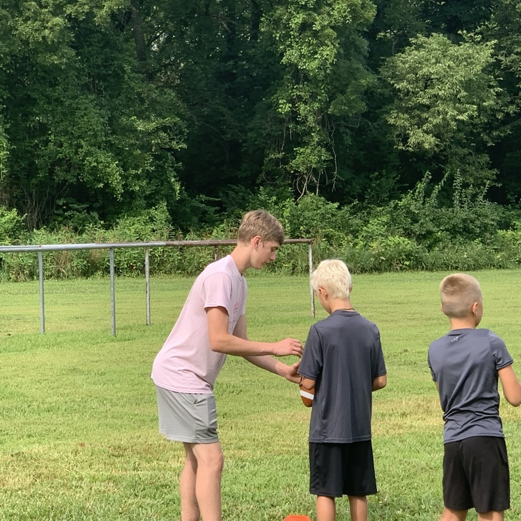 Good job by our High School kids working with our youth at summer football camp this morning!
