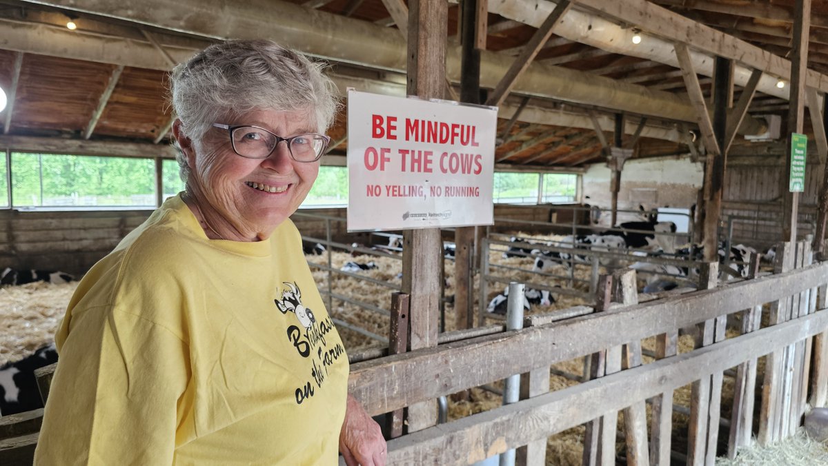 Wellington County Dairy Farmer Jean Kent volunteered in the calf barns. She answered questions and explained the set-up to calf barn visitors during Breakfast on the Farm.

📸: Sharon Grose