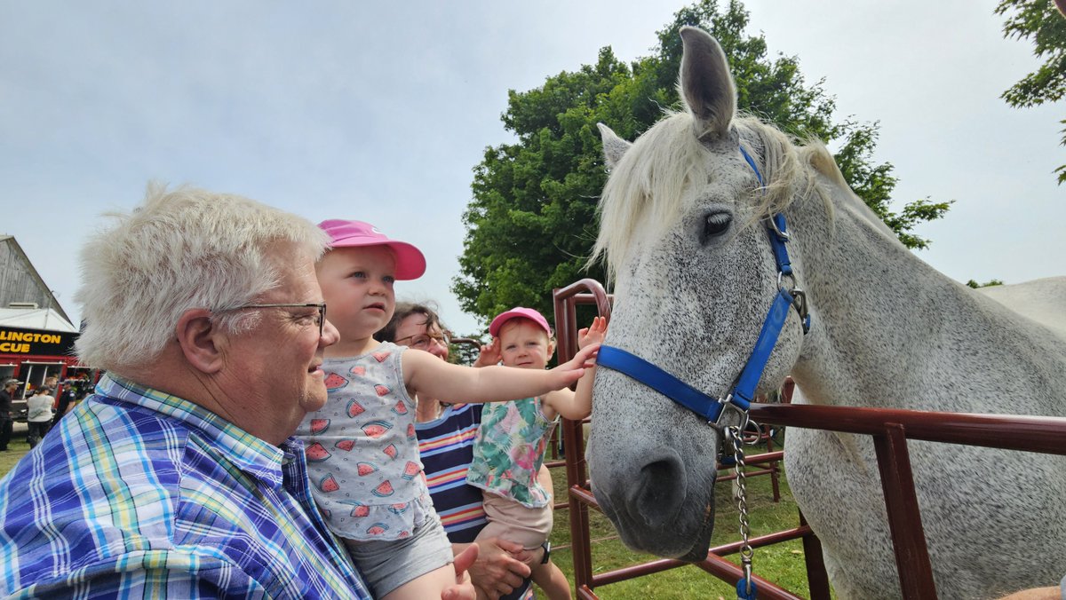 Two-year-old McIntosh twins, Taytum and Paisley, wanted to give John Northcote's big draft horse a friendly little pat. They were in awe of the horses' size. They attended Breakfast on the Farm with their grandparents, Chris and Bonnie McIntosh of Arthur.

📸: Sharon Grose