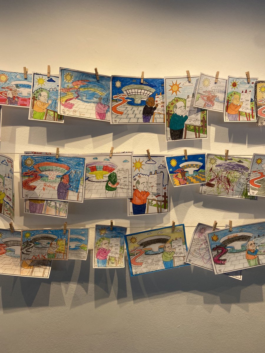 o mac de férias e as crianças se divertindo pintando niemeyers