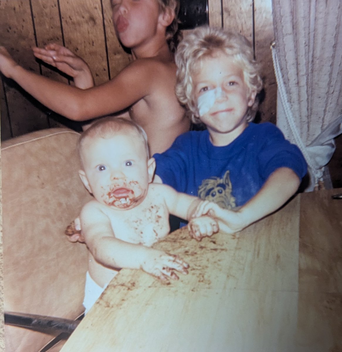 When I was about 5, I played lawn darts with regular darts. Got a new hole in my face. Also, I have two brothers.