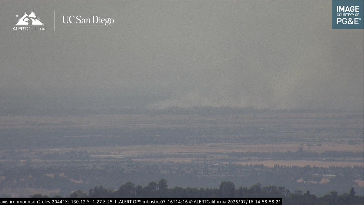 The fire has jumped E Levee Rd but is being held by the water next to it.