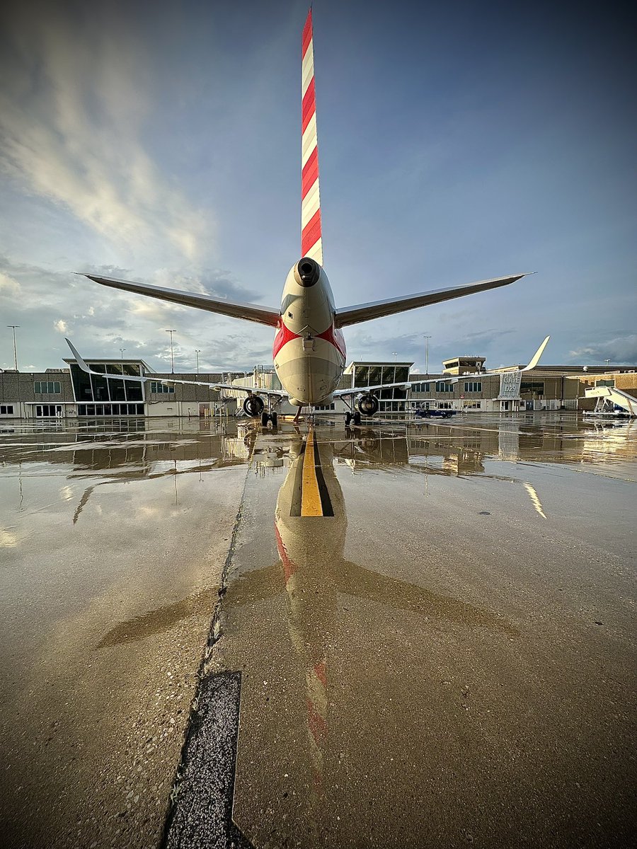 A321 reflections on our ramp after the rain.