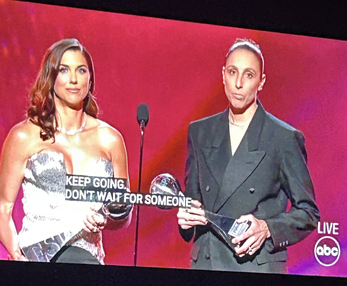 Alex Morgan on stage with her jugulars on display while Diana Tausasi dressed like john wick #theespys #would