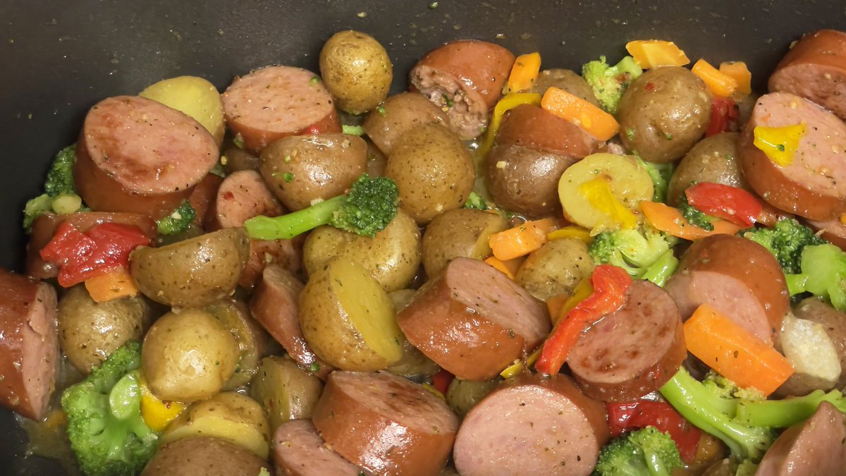 Made this dinner up tonight! Kielbasa, potatoes, a bag of garlic olive oil veggie blend, and some extra seasonings. So good!