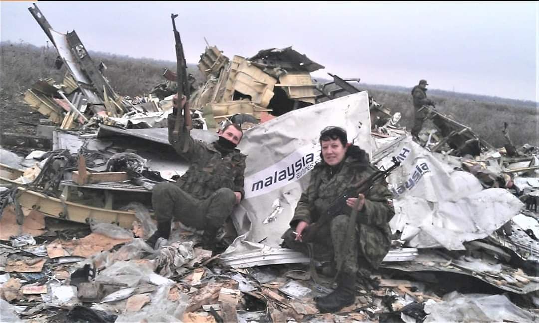 dim0kq's tweet image. Russian soldiers are taking pictures near Boeing MH17 they downed with anti air missile from Buk they brought to Ukraine from Russia.
It happened exactly 11 years ago. Russia killed 298 innocent foreigners.
As Ukrainian, I will never forgive this.