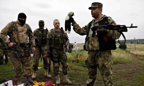 dim0kq's tweet image. Exactly 11 years ago Russians shoot down civilian airliner MH17 over Ukraine, killing 298 passengers.
In this picture, they proudly pose with personal belonging of victims, right at the crash site.
Absolute fucking scum of this planet.