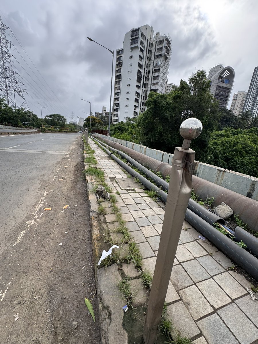 RRanshinge's tweet photo. @mybmc kw ward look at railings many are been robbed and iron is rust. it is dangerous because nothing can stop you falling into the Nala if any citizen lose the  balance. https://t.co/kF2WGQXJDD