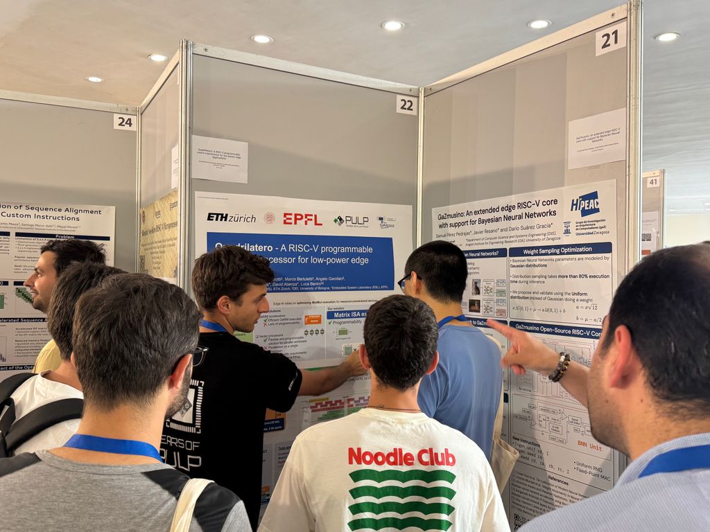 pulp_platform's tweet image. Greetings from #ACACES2025 in Fiuggi! We are sharing some photos from the location and of Danilo presenting his work on Quadrilatero: A RISC-V programmable matrix coprocessor for low-power edge applications during the poster session arxiv.org/abs/2504.07565.