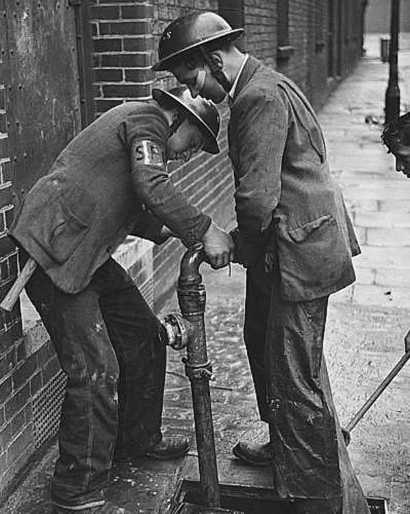 OldEngland1066's tweet image. Teenage boys worked as unofficial firefighters during the blitz, East London, 1941.