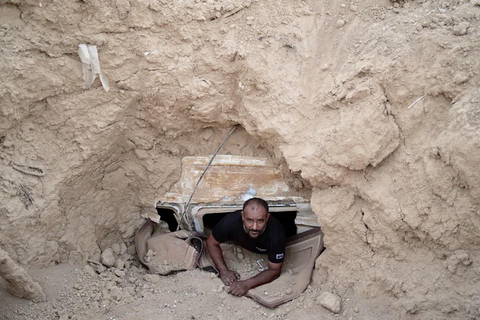 havenosecrets's tweet image. Mideast Wars Homemade Bomb Shelters!
Ahmad Abu Ganima poses for a portrait in the window of the minibus buried in the earth, a makeshift #bombshelter his family uses in #KhashemZaneh, an unrecognized Bedouin village in the Negev Desert, southern Israel, Wednesday, July 2, 2025.