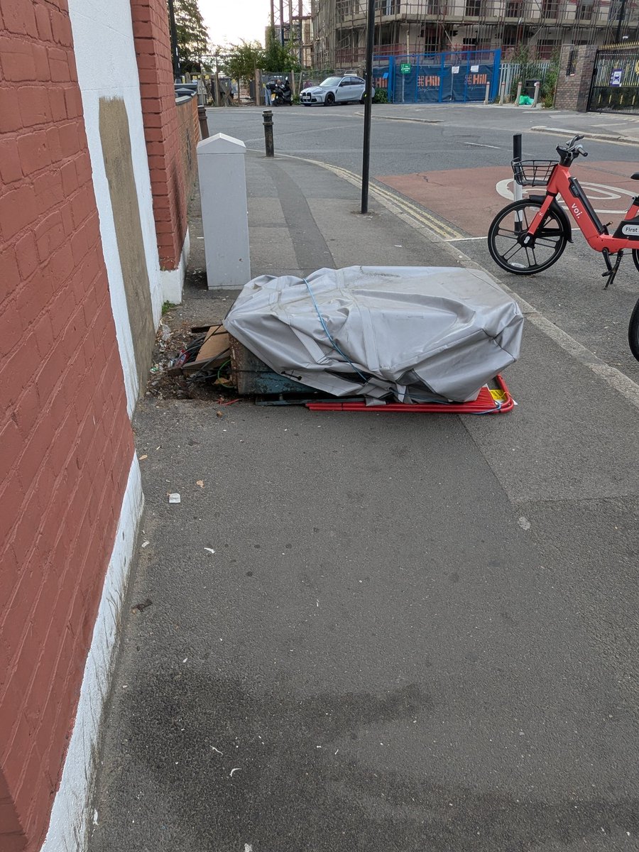 Hi <a href="/virginmedia/">Virgin Media ❤️</a>. I understand this fallen over box in Southall is yours? I reported it to <a href="/EalingCouncil/">Ealing Council</a> on Monday and by the end of the day they had reported it to you as a matter of urgency. Yet it remains, blocking the pavement. Please can you tell me when it will be moved?