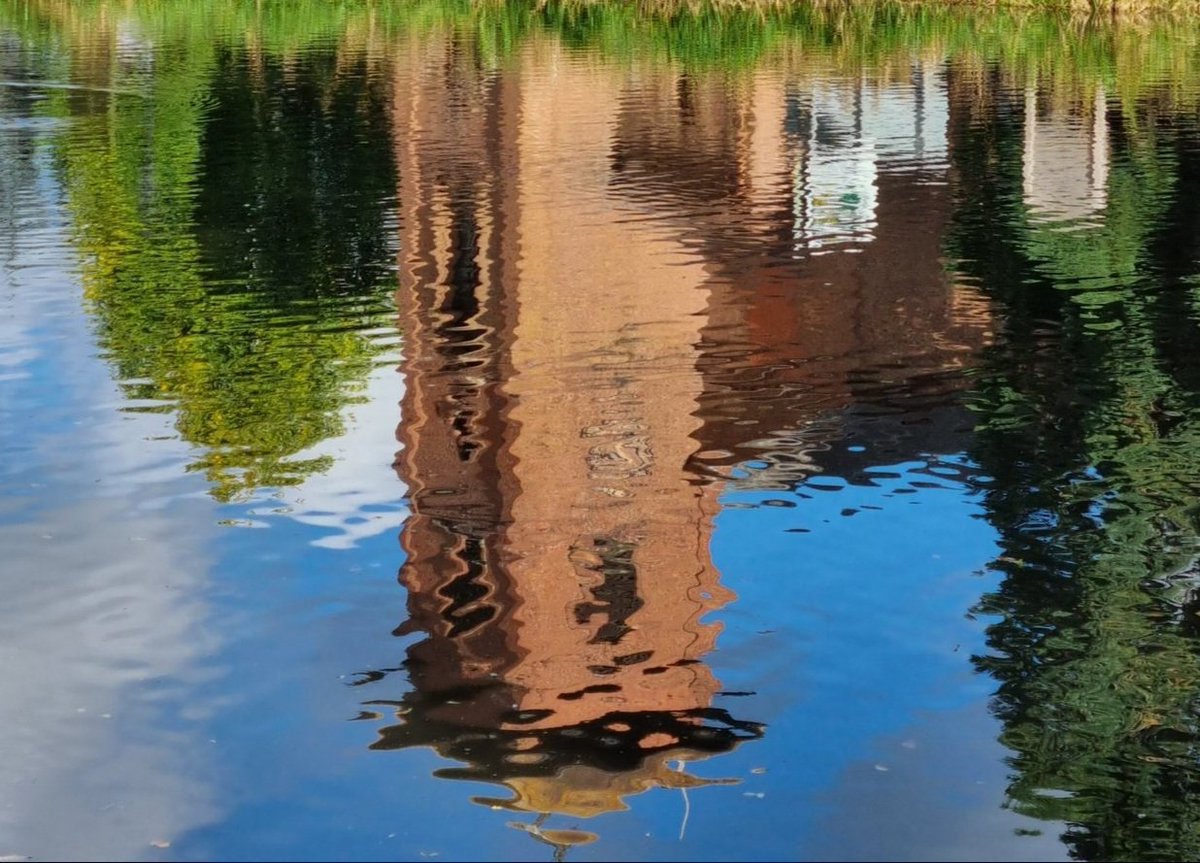 This reflection looks like we have an *Upside Down church in North Shropshire