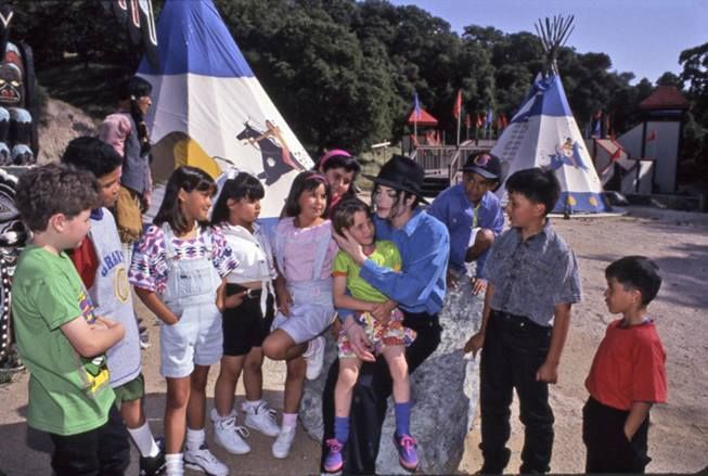 mjsleftnipple's tweet photo. i just love how children feel safe and comfortable when michael's with them, how they'll smile and immediately flock around him 🥺 https://t.co/YWBMfcT8tm