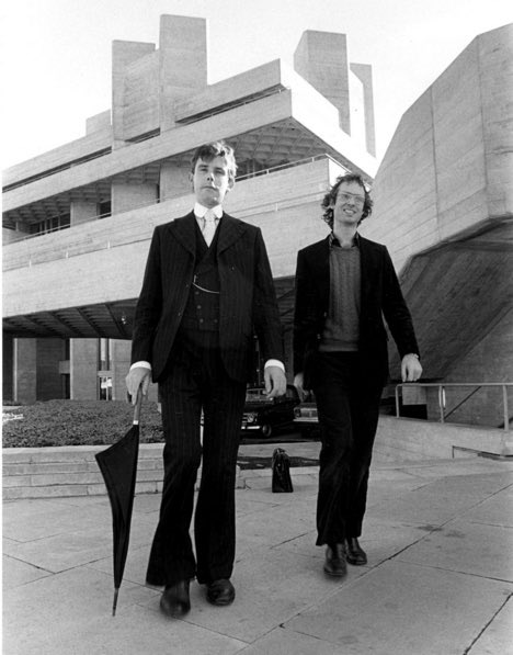 OSaumarezSmith's tweet image. Very sad to hear of Andrew Saint's death, pictured here giving huge architectural history energy with Gavin Stamp. His books all written with tremendous style across a terrific range of topics. Towards a Social Architecture, his superb history of post-war schools my favourite.