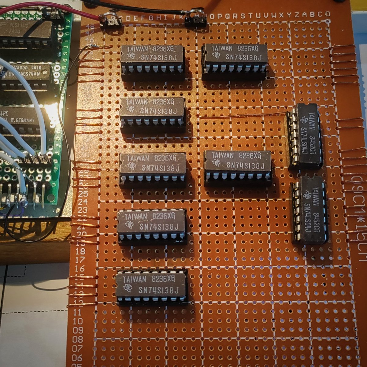 matseng's tweet image. It took me a while to figure out why the current went up from 450mA to 950mA when I hooked up this card. Then I realized that those are 74S not 74LS. 😁 I probably should replace them if I can find a tube of the LS versions. But for the time being they'll have to do.