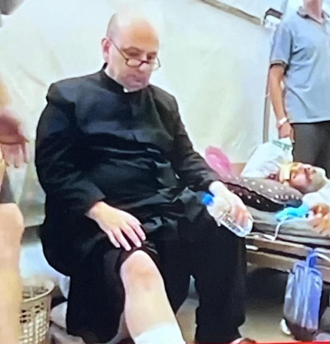 Ramy Abdu| رامي عبده (@ramabdu) on Twitter photo Breaking: A photo of Father Gabriel, the parish priest, receiving medical treatment after being injured in the Israeli strike on the Latin Church monastery. The number of dead and wounded continues to rise. Breaking: A photo of Father Gabriel, the parish priest, receiving medical treatment after being injured in the Israeli strike on the Latin Church monastery. The number of dead and wounded continues to rise.