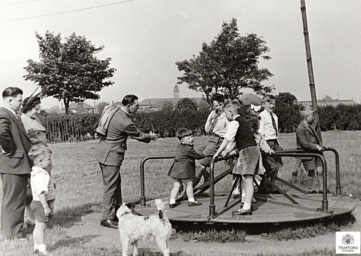 TraffordArchive's tweet image. Image of the Week
Children at play, Gorse Hill Park, Stretford in 1951.
Trafford Local Studies collection, cat. ref. TL099
#stretford #park #roundabout #playground