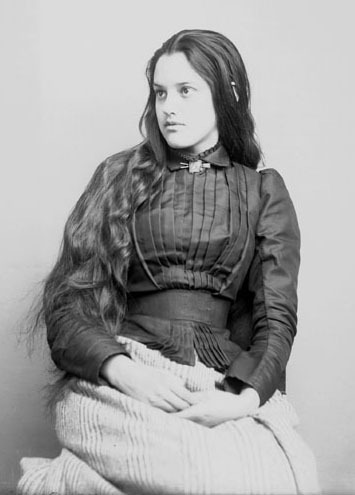 Portrait of Marcia Pascal, a young Cherokee woman. Photographed in 1880. Glass Negatives of Indians (Collected by the Bureau of American Ethnology)