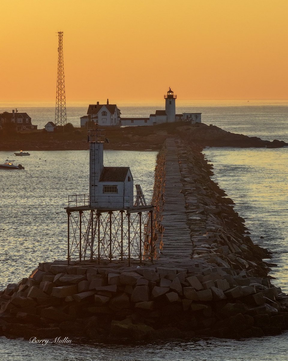 Lighthouses_NE's tweet image. Dog Bar Light during sunrise with Eastern Point Lighthouse in the background. Gloucester, Massachusetts.