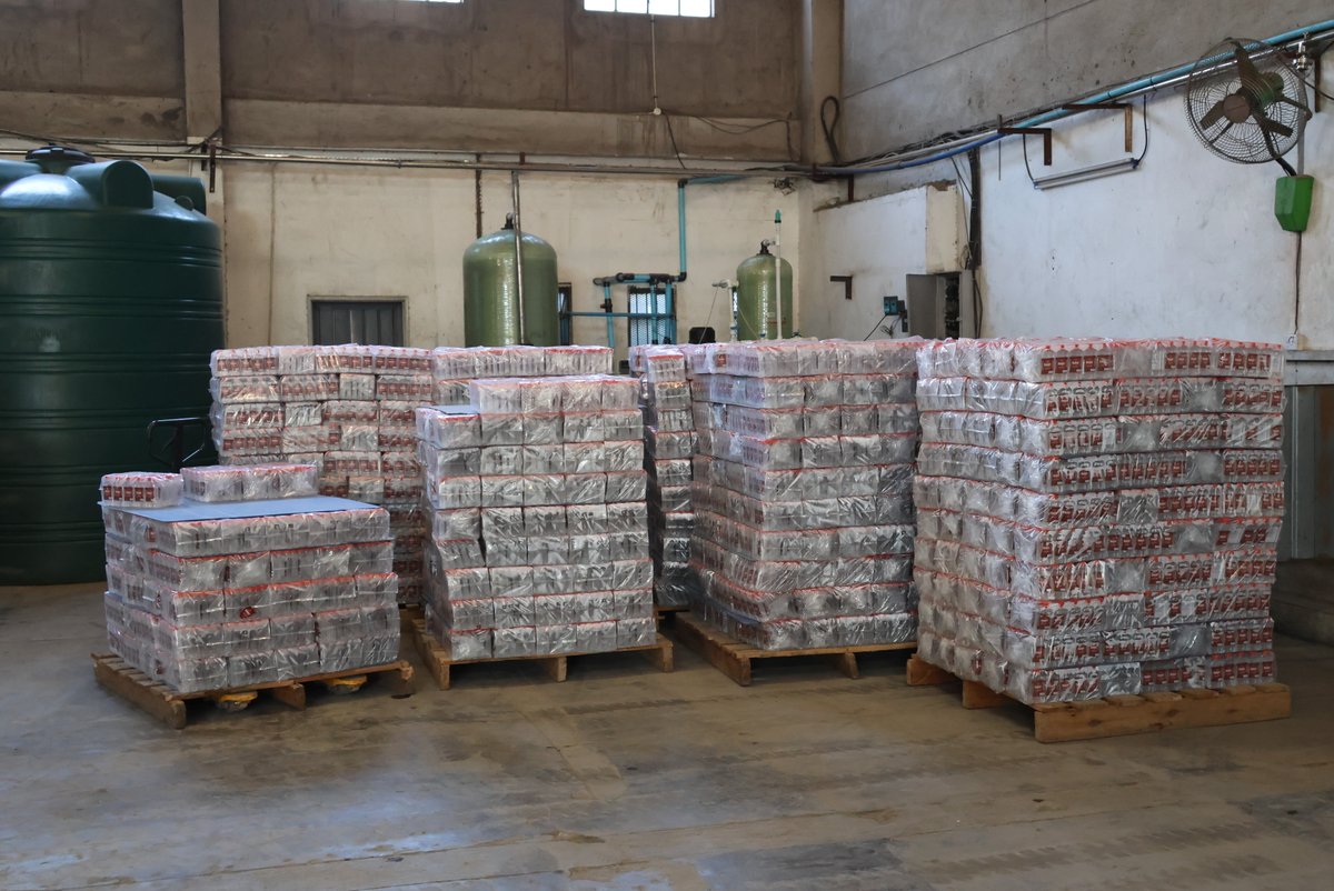 PoliceZimbabwe's tweet photo. The ZRP arrested over 30 suspects who include directors, managers and employees at Mambo Manufacturing Company in Harare where they were manufacturing spirits without observing health regulations and the law , disregarding the health and safety of Zimbabweans. The Police recovered substances worth US$165 000.00. #notodrugs