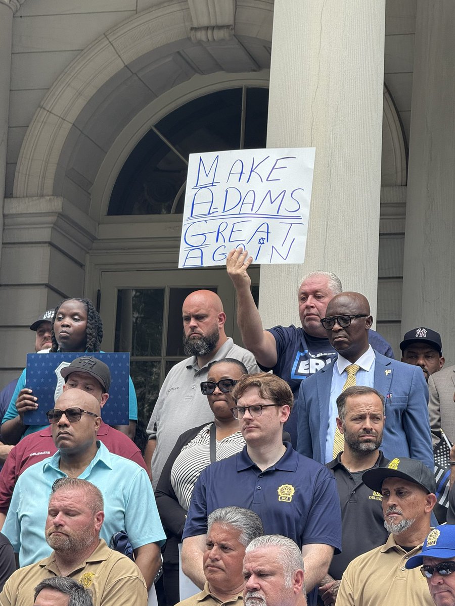 BryanLlenas's tweet image. “Make Adams Great Again” sign at event today for NYC Mayor Eric Adams - announcing endorsement from 14 law enforcement unions.