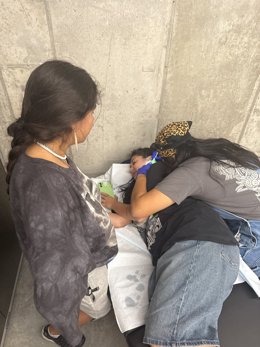 KanahusFreedom's tweet image. My youngest daughter getting a handpoke tattoo by Mina at the traditional indigenous tattoo gathering in Rapid City, SD Oglala Lakota Territory